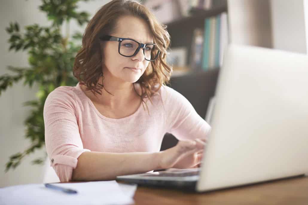 Woman applying for a MEFA Loan on a laptop