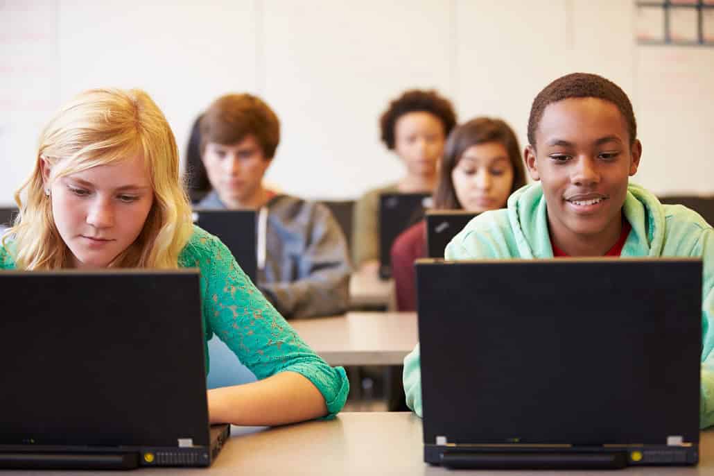 Students using laptop in class