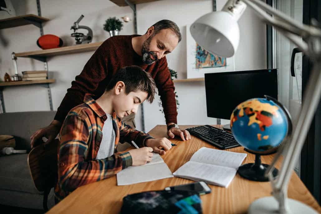 Father and son doing homework