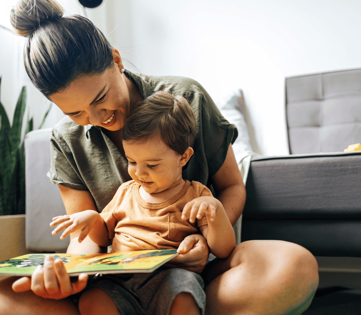 woman playing with toddler