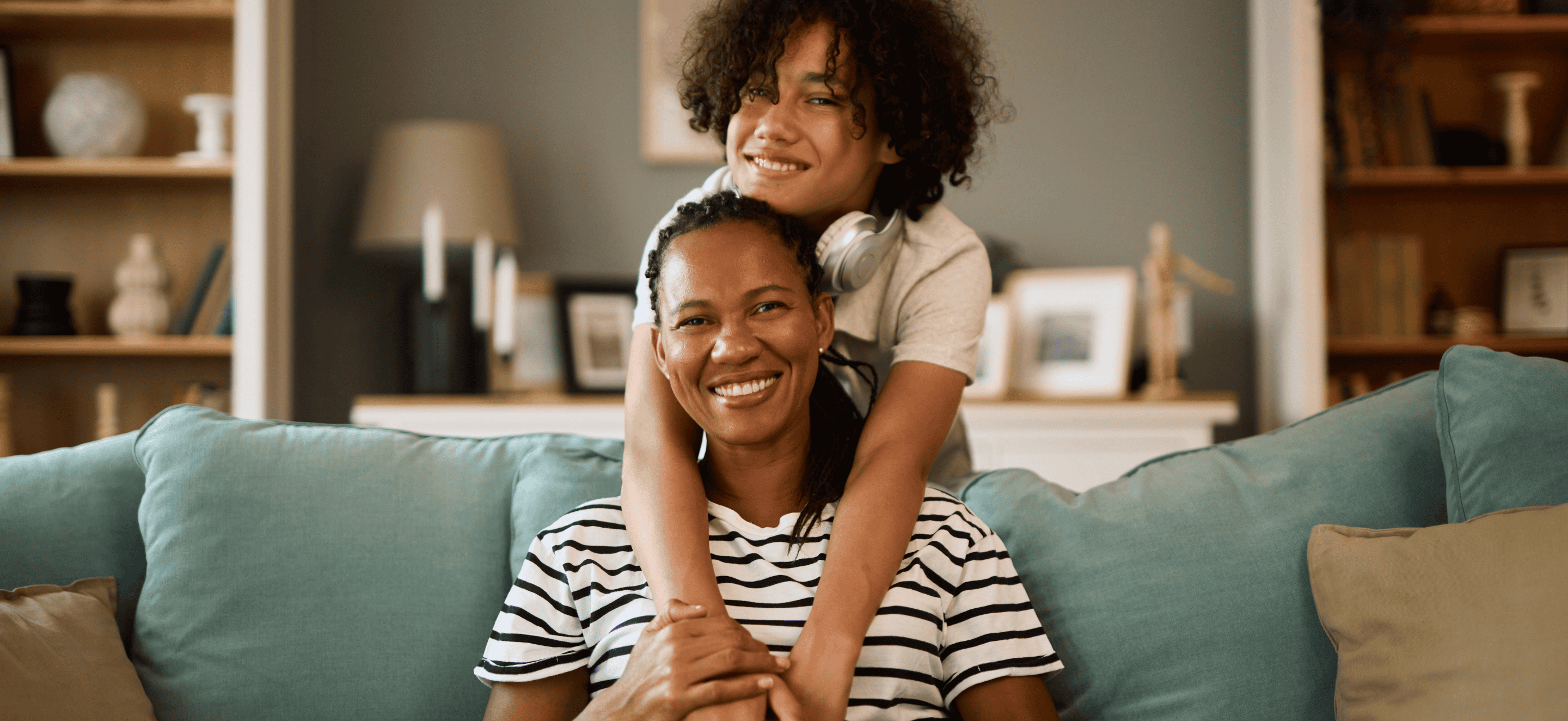 Daughter hugging mom