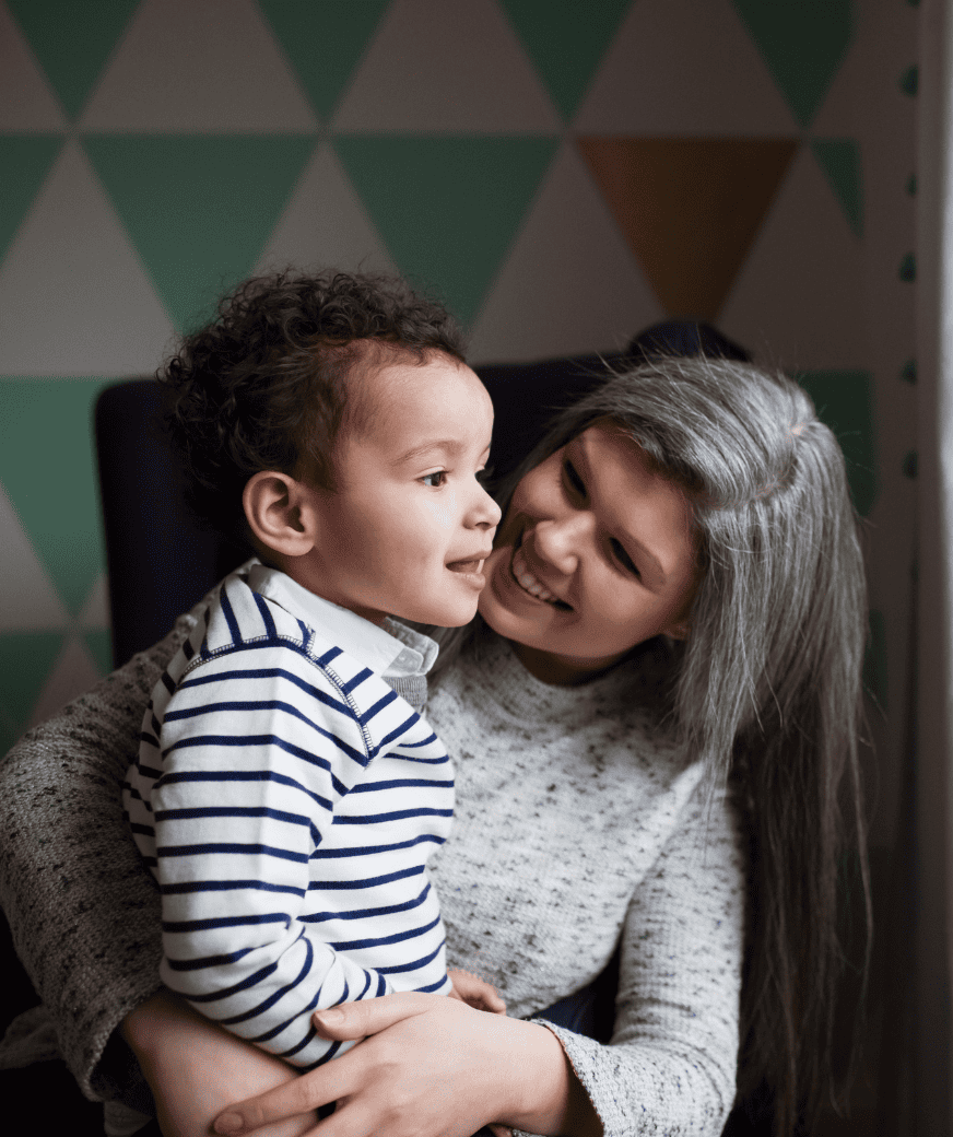 woman carrying child